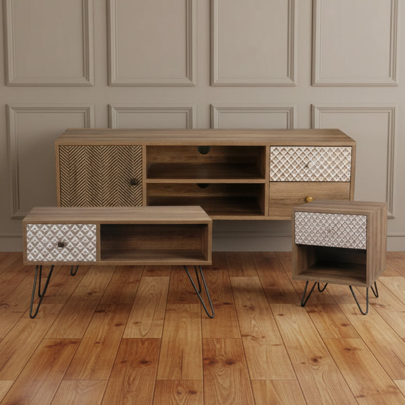 Wooden furniture set with patterned doors and drawers on a white background